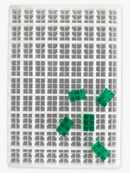 9.35mL 6-piece brick breaker gummy mold with 81 cavities and emerald green segmented brick gummies